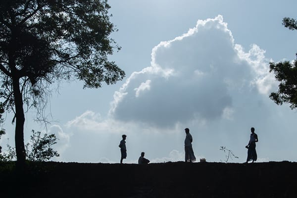 Travel image with local in silhouette