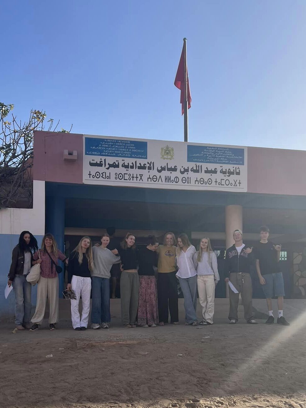 After-school students gathered in front of a building in Morrokko