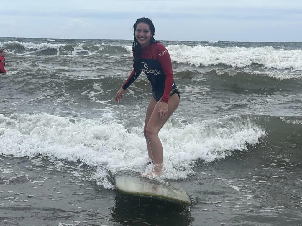 Girl surfer in Bali