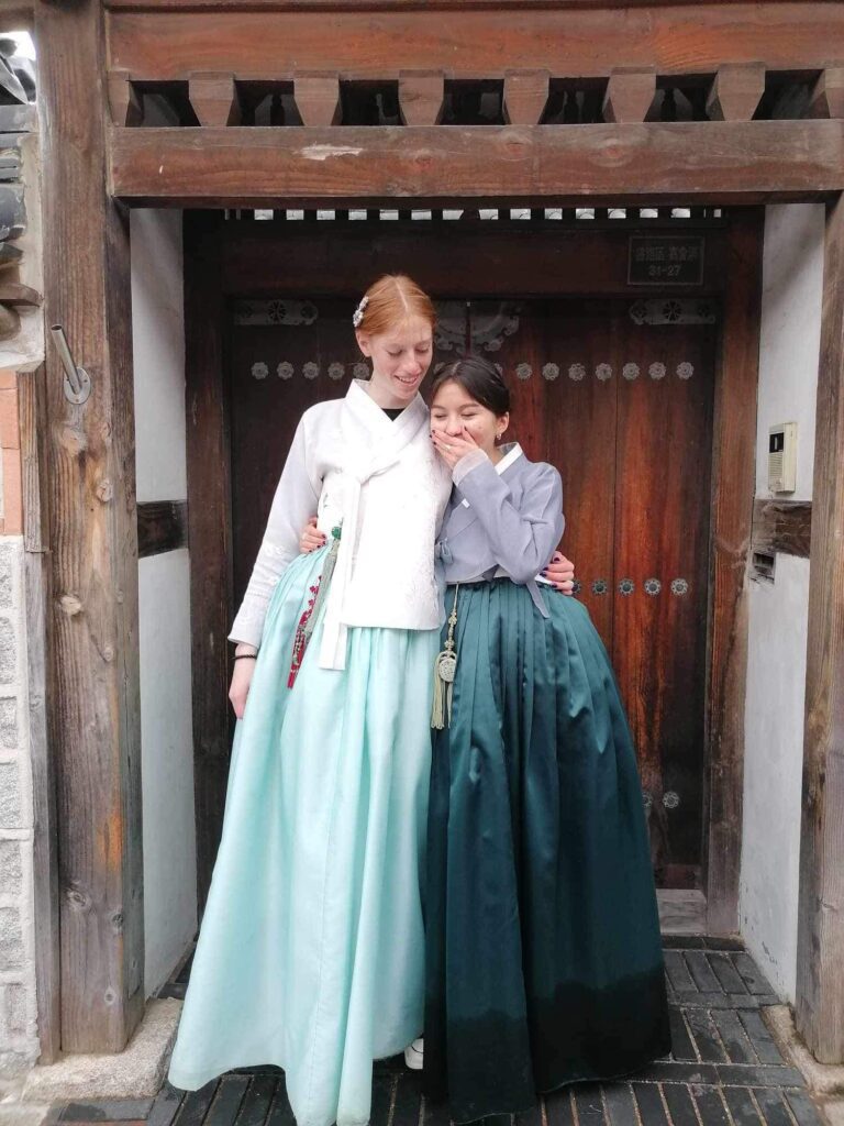 Two girls wearing dresses from South Korea 