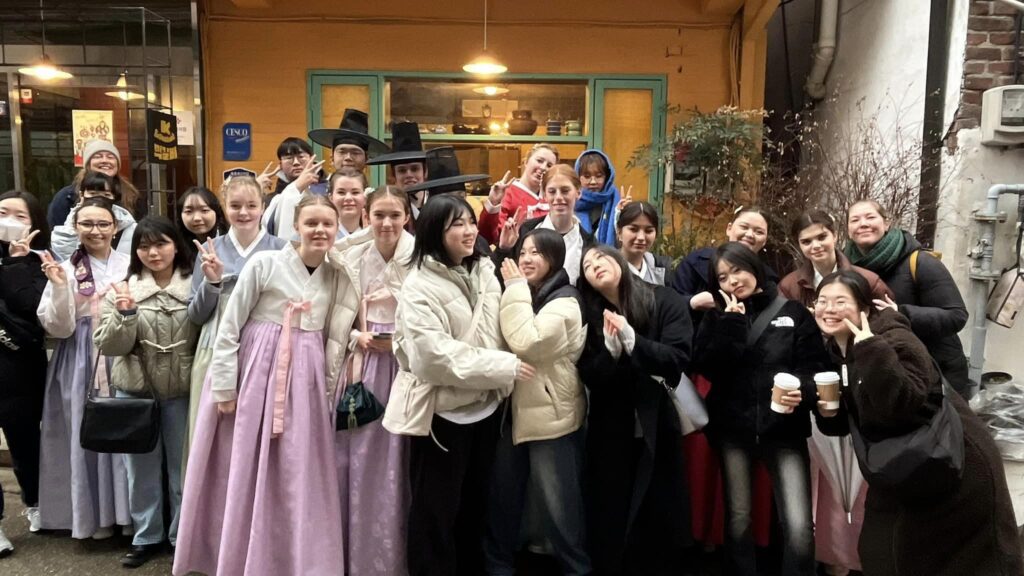 Students crowded in front of a building in South Korea