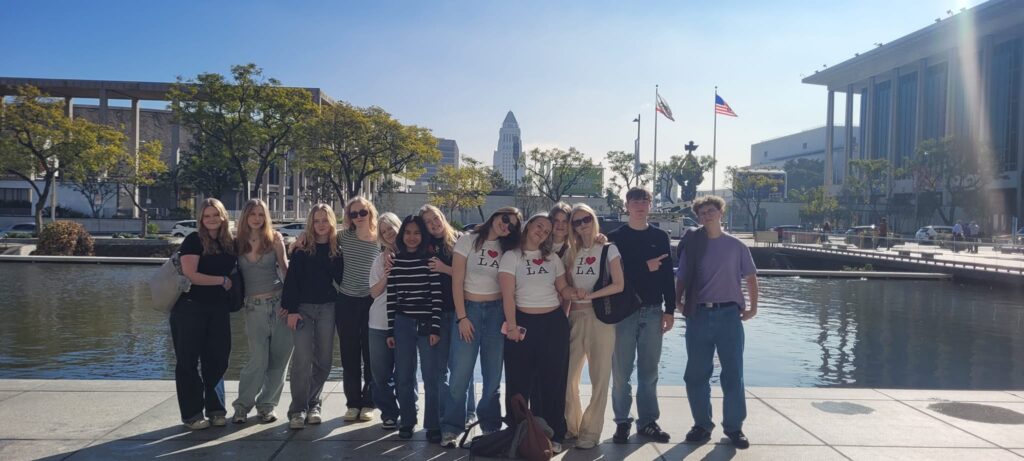 After-school students gather in front of a fountain in the USA