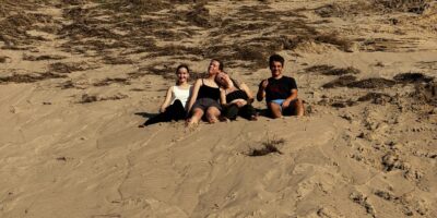 Ranum Efterskole Students sitting on a sand hill